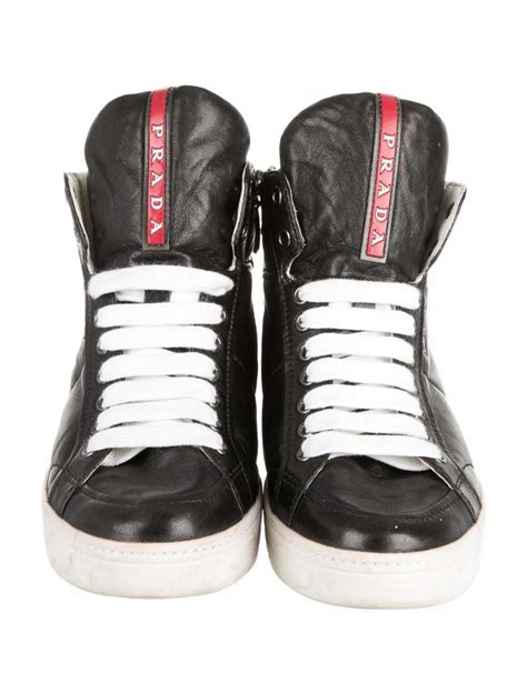 prada high top designer sneakers.